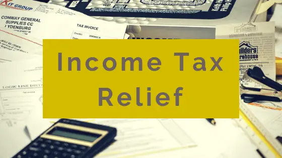 Tax Invoice, calculator and file with wording Income Tax Relief.