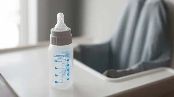 A feeding bottle as part of baby first-year expenses.